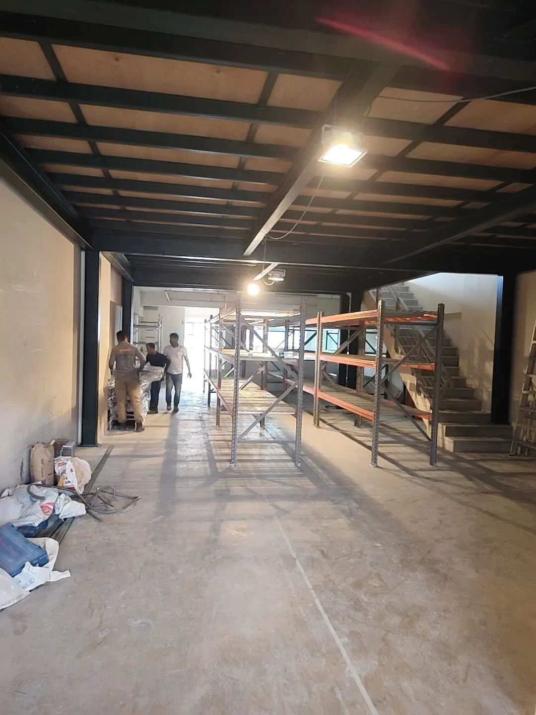 Long corridor view of the Frontier Industrial Building unit during the mezzanine construction works
