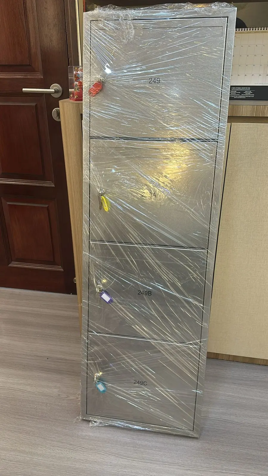 Completed SS304 stainless steel mailbox unit wrapped for protection prior to delivery for the Outram Road project