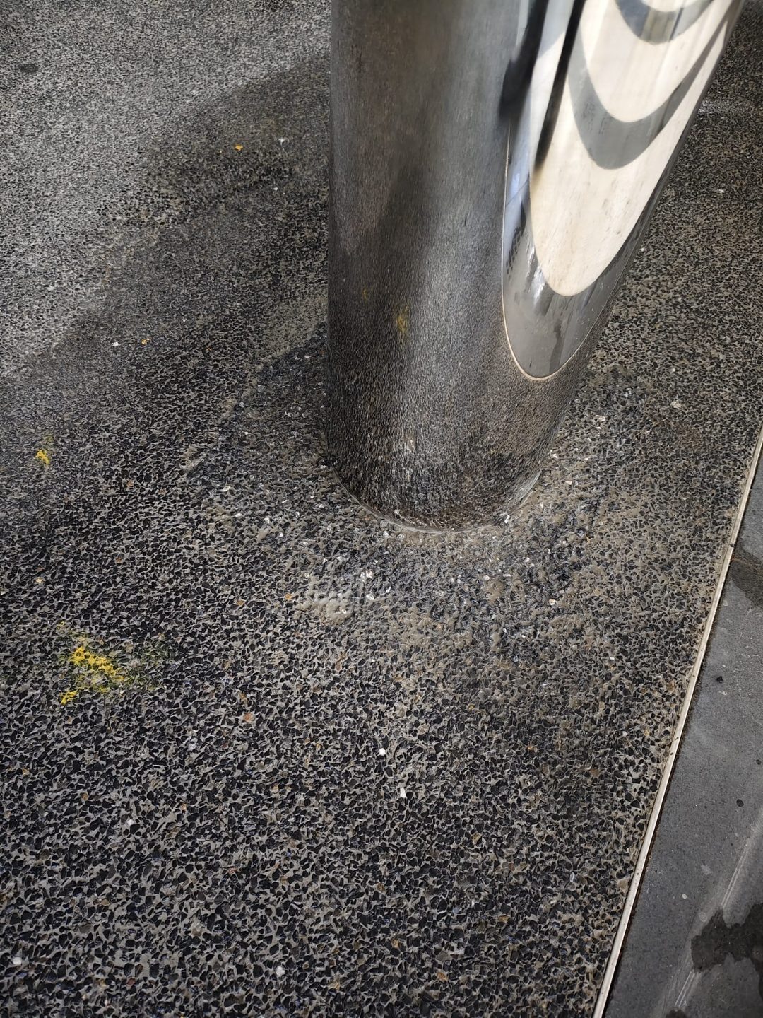 Completed line of stainless steel bollards at Rainbow Centre defining the pedestrian/vehicle boundary at the facility entrance