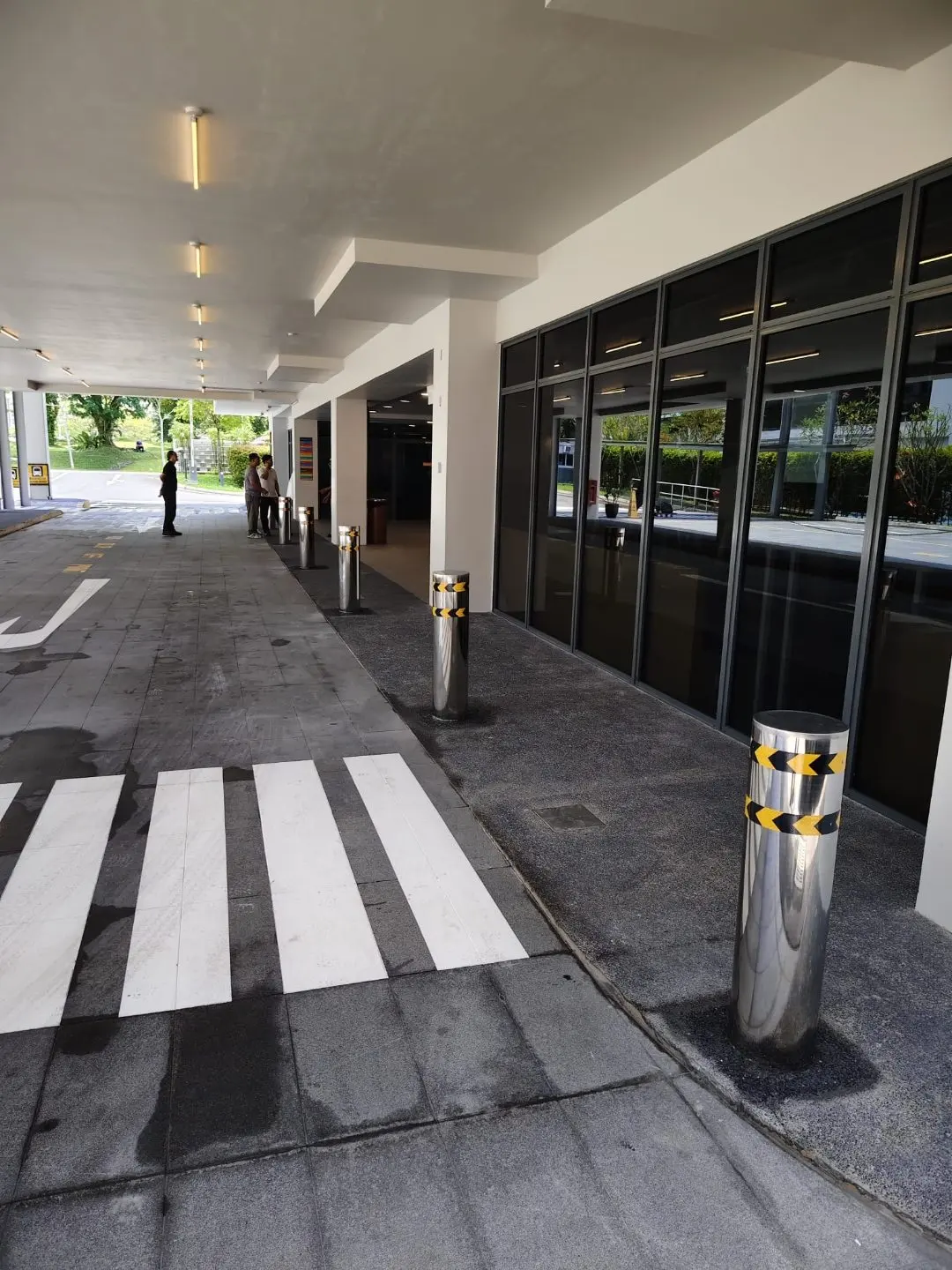 Detail of stainless steel bollard alignment and spacing at Rainbow Centre