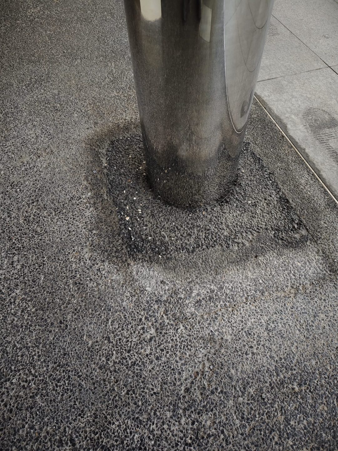 Wider context view of the stainless steel bollard run at Rainbow Centre